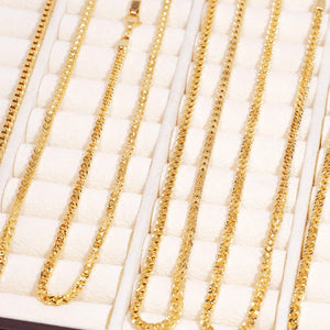 3mm 18k Gold Plated Italian Franco Link Chain bulk display shot, multiple different length shiny gold Franco necklaces neatly arranged inside soft white compartment jewelry tray, polished tangle resistant flexible Franco chain links, unisex hip hop stacking gold chain available in 18 20 24 inch sizes, durable tarnish free gold bling necklace compatible with custom pendants, close up flat lay product showcase of classic streetwear Franco link jewelry for men women, premium hand polished everyday statement