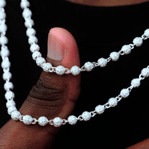 Close‑up shot of 4mm Iced Stellar Ball Bead Chain held in hand, fully paved flawless VVS simulated diamonds round ball bead link chain, white gold plated hip hop street jewelry for men, RDRIP JEWELRY SINCE 2016