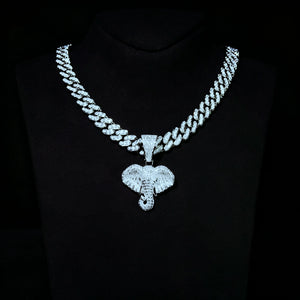 Iced micro paved pharaoh elephant head pendant necklace, fully AAA cubic zirconia paved elephant charm, iced out miami cuban link chain set, premium hip hop street bling jewelry displayed on black bust, sparkling men statement pendant gift RDRIP JEWELRY