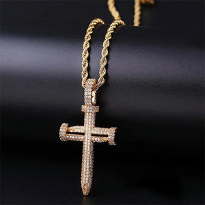 Hanging shot of 18k gold plated Iced Out Nail Cross Pendant, full pave AAA cubic zirconia nail shaped crucifix pendant for men, matched with premium twisted rope chain displayed on smooth dark black background RDRIP JEWELRY