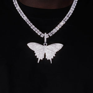 Micro‑pave iced out white gold butterfly pendant necklace worn on model with baguette chain fully paved flawless VVS simulated diamonds hip hop street wear jewelry lifestyle wearing photo RDRIP JEWELRY