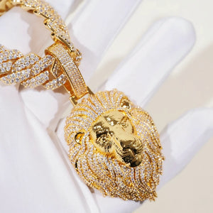 Premium Full Pave Iced‑Out Lion Head Pendant held by white gloved hand with matching full iced cuban chain,detailed close‑up showing lion mane texture and stone brilliance,18K gold plated VVS simulated diamond men hip hop jewelry,RDRIP JEWELRY