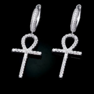 18K Silver Plated Iced Ankh Cross Dangle Huggie Hip Hop Earrings, micro pave VVS simulated diamond Egyptian life symbol drop earrings, unisex hip hop bling jewelry on black background RDRIP JEWELRY