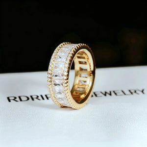 18K gold plated wide baguette eternity ring double sided micro pave 8mm band flawless VVS simulated diamonds full icy bling men hip hop statement ring single piece placed on branded white jewelry box RDRIP JEWELRY