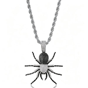 Two tone black and white iced tarantula spider pendant with silver rope chain on clean white background, micro pave black and white VVS simulated diamonds hip hop necklace charm for men, contrast color spider bling streetwear jewelry product shot RDRIP JEWELRY