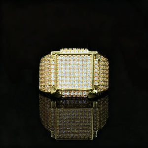 Front view of heavy weight men full pave square hip hop ring 18k gold plated hand set aaa cubic zirconia stones wide icy band luxury rapper finger jewelry studio shot with black reflective background RDRIP JEWELRY