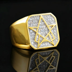 Gold plated men star of david hexagram iced cubic zirconia signet ring RDRIP JEWELRY, studio product shot on glossy black reflective surface, fully micro pave bling hip hop square statement ring, close‑up front side view showing heavy gold band and sparkling cz stones