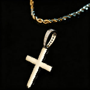 gold toned 925 sterling silver bling classic cross pendant back side view, showing polished metal back and stone‑encrusted bail detail, partial rope chain in soft background, premium iced religious hip hop pendant close‑up RDRIP JEWELRY