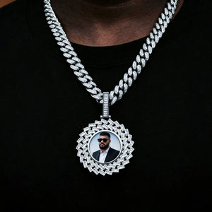 Large 3D Baguette Sunburst Custom Photo Pendant Necklace, silver tone iced out personalized portrait photo medallion worn on neck, matched with full iced diamond cuban link chain, lifestyle wearing shot against black t-shirt background, RDRIP JEWELRY