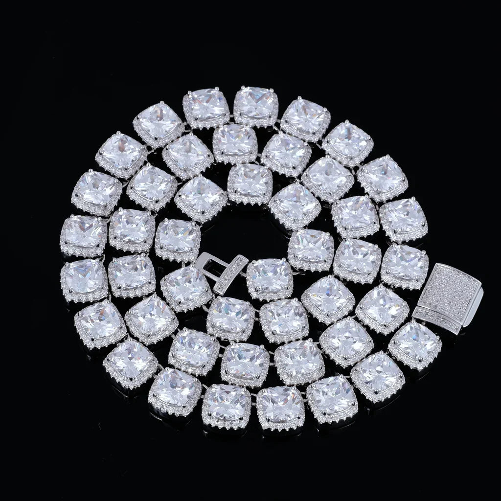 Full‑length coiled flat‑lay view of 10MM Glacier Cushion Clustered Tennis Chain in White Gold, whole necklace neatly coiled showing complete row of hand‑set VVS simulated cushion diamonds with clustered halo setting, fully iced pave lock clasp hardware visible, premium icy bling men hip hop jewelry shot on solid black background RDRIP JEWELRY
