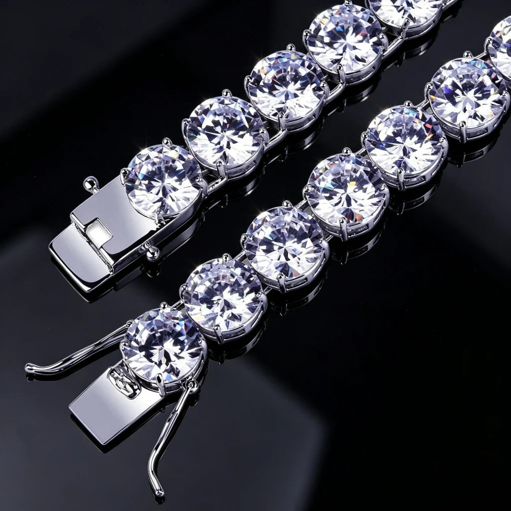 Close‑up comparison view of double lock safety clasp on 10mm silver iced out sparkle tennis bracelet, shot on glossy black reflective surface, large round prong‑set VVS simulated diamond stones, heavy duty safety locking mechanism, silver plated unisex hip hop bling wrist jewelry for men women, RDRIP JEWELRY
