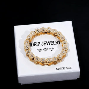 11mm Iced Out Bike Chain Link Bracelet for men, fully hand‑set VVS simulated diamond stones no glue craftsmanship, white gold plated hip hop bling drip jewelry, icy full pave bike chain wrist bracelet placed on branded gift box against black dark background, premium hiphop fashion accessory RDRIP JEWELRY
