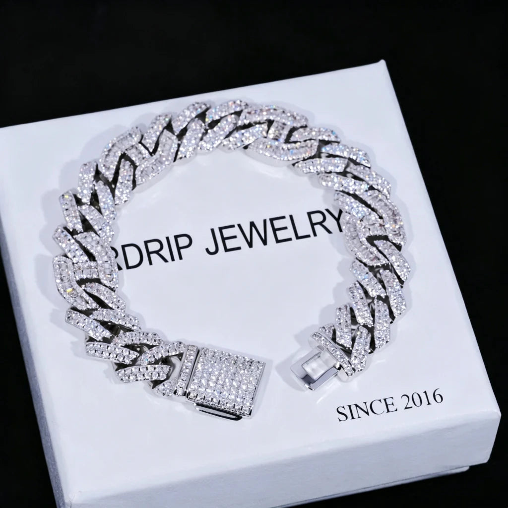 12mm Prong Set Iced Baguette Curb Bracelet White Gold Plated laid flat on branded white gift box display, fully prong set rectangular baguette VVS simulated diamond curb link wrist chain with full iced out lock clasp, luxury hip hop men jewelry gift set packaging, premium bling icy curb bracelet ideal for gifting, handmade heavy diamond encrusted streetwear wrist accessory RDRIP JEWELRY
