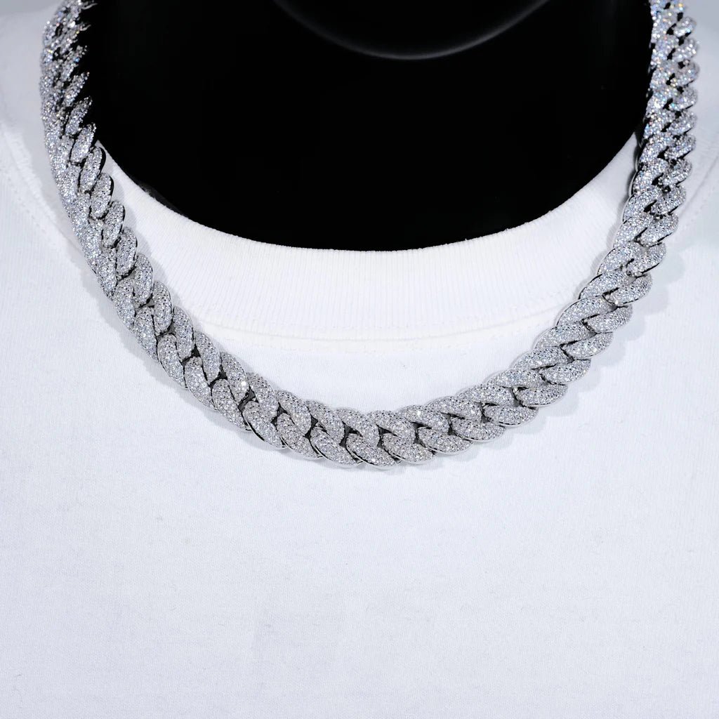 Close up studio shot of 14mm 3 row bubble dense fully paved iced miami cuban link chain white gold plated fully hand prong set flawless VVS simulated diamond heavy chunky hip hop mens necklace displayed on black bust mannequin with plain white crew neck tee soft lighting ultra clear shiny stone details full stone encrusted clasp bling streetwear rapper jewelry product showcase RDRIP JEWELRY
