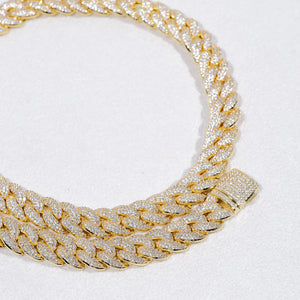 Top down flat lay close up detail shot of single 14mm 3 row bubble dense fully iced miami cuban link chain 18k gold plated hand prong set flawless VVS simulated diamonds heavy chunky hip hop mens necklace fully diamond encrusted safety side lock clasp bright reflective stone texture soft white matte background high resolution bling rapper streetwear jewelry product shot RDRIP JEWELRY
