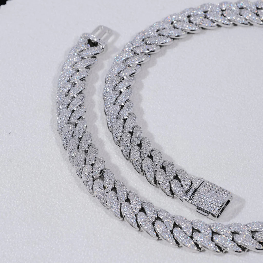 Flat lay close up detail shot of single 14mm 3 row bubble dense fully iced miami cuban link chain white gold plated hand prong set flawless VVS simulated diamonds heavy chunky hip hop mens necklace both front and back safety clasp fully micro paved with shiny stones matte white soft background high resolution street rapper bling jewelry product showcase RDRIP JEWELRY
