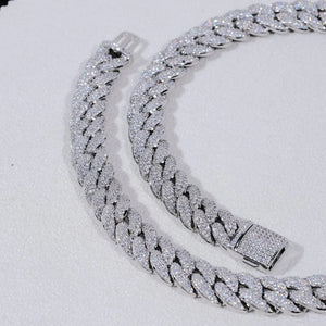 Flat lay close up detail shot of single 14mm 3 row bubble dense fully iced miami cuban link chain white gold plated hand prong set flawless VVS simulated diamonds heavy chunky hip hop mens necklace both front and back safety clasp fully micro paved with shiny stones matte white soft background high resolution street rapper bling jewelry product showcase RDRIP JEWELRY
