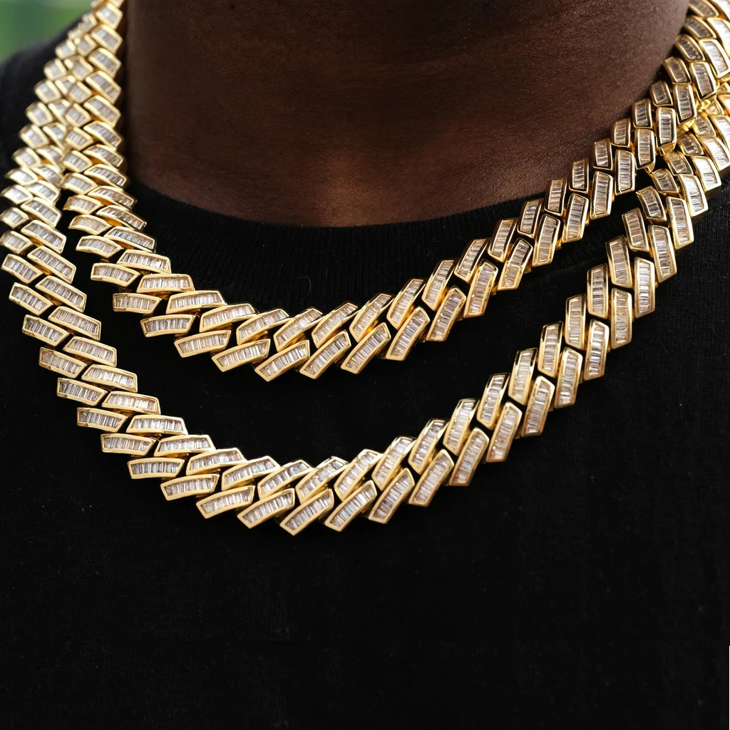 14MM Baguette Channel‑Set Miami Cuban Link Necklace, 18K gold plated full iced‑out men hip hop chain, hand‑set flawless VVS simulated baguette stones, two‑layer stacked close‑up view on deep dark skin tone male model without beard, wearing plain black crew neck shirt, showcasing brilliant baguette cut stones and channel‑set links, luxury heavy bling rapper streetwear statement jewelry RDRIP JEWELRY
