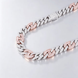 Close‑up detail shot of 14mm iced prong two‑tone cuban choker link necklace, showing fully iced lock clasp and two‑tone white pink links, hand‑set flawless VVS simulated diamonds, heavy solid copper with 18K gold plated finish, icy hip hop bling statement jewelry for men street fashion RDRIP JEWELRY
