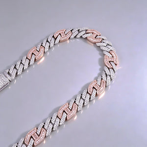 Top view shot of 14mm iced prong two‑tone cuban choker link necklace for men, white and pink mixed tone hip hop chain, hand‑set flawless VVS simulated diamonds, heavy solid pure copper base with 18K gold plated finish, bling icy statement streetwear jewelry for party night out RDRIP JEWELRY
