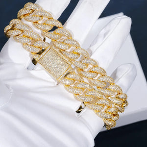 15mm 5-Row Fully Paved Iced Cuban Link Necklace for men, 18K gold plated heavy miami curb chain fully set with sparkling VVS D color moissanite stones, full pave diamond encrusted wide cuban chain with fully iced push box clasp, ultra bling hip hop rapper statement jewelry, thick icy cuban chain closeup shot held in soft white cotton gloves, premium streetwear mens ice accessory, durable polished gold finish heavy curb chain, ideal luxury hip hop gift for men, high clarity shimmering lab diamond cuban link 