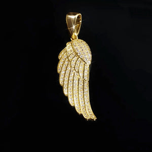 Side profile shot of 15mm Iced Micro‑Paved Single Seraph Wing Pendant, yellow gold plated copper fully micro paved cubic zirconia stones, detailed feather wing texture hip hop bling charm, black reflective background, RDRIP JEWELRY
