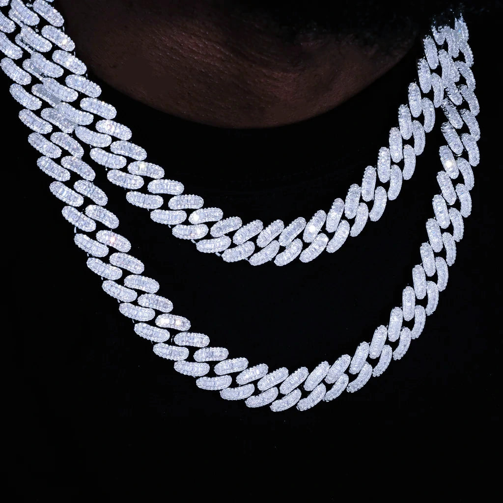 Triple multi‑layer stacked 16MM Rect Baguette Cuban Link Chain worn on dark‑skin black man neck, iced‑out mixed rectangular baguette cut and round flawless VVS simulated diamonds men’s miami cuban necklace, white gold plated heavy hip‑hop bling rapper jewelry, full layered sparkle display shot against deep solid black studio background, RDRIP JEWELRY
