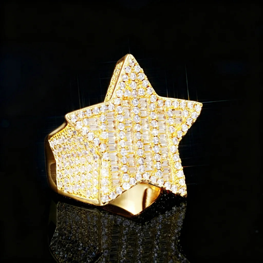 Men’s heavy‑weight 18k gold‑plated 3D micro‑pave pentagram star iced out ring, mixed baguette and round cut AAA cubic zirconia stones, full paved bling hip‑hop rapper statement ring, gold tone finish, photographed on black glossy mirror reflection background, luxury urban hip‑hop jewelry for men, RDRIP JEWELRY
