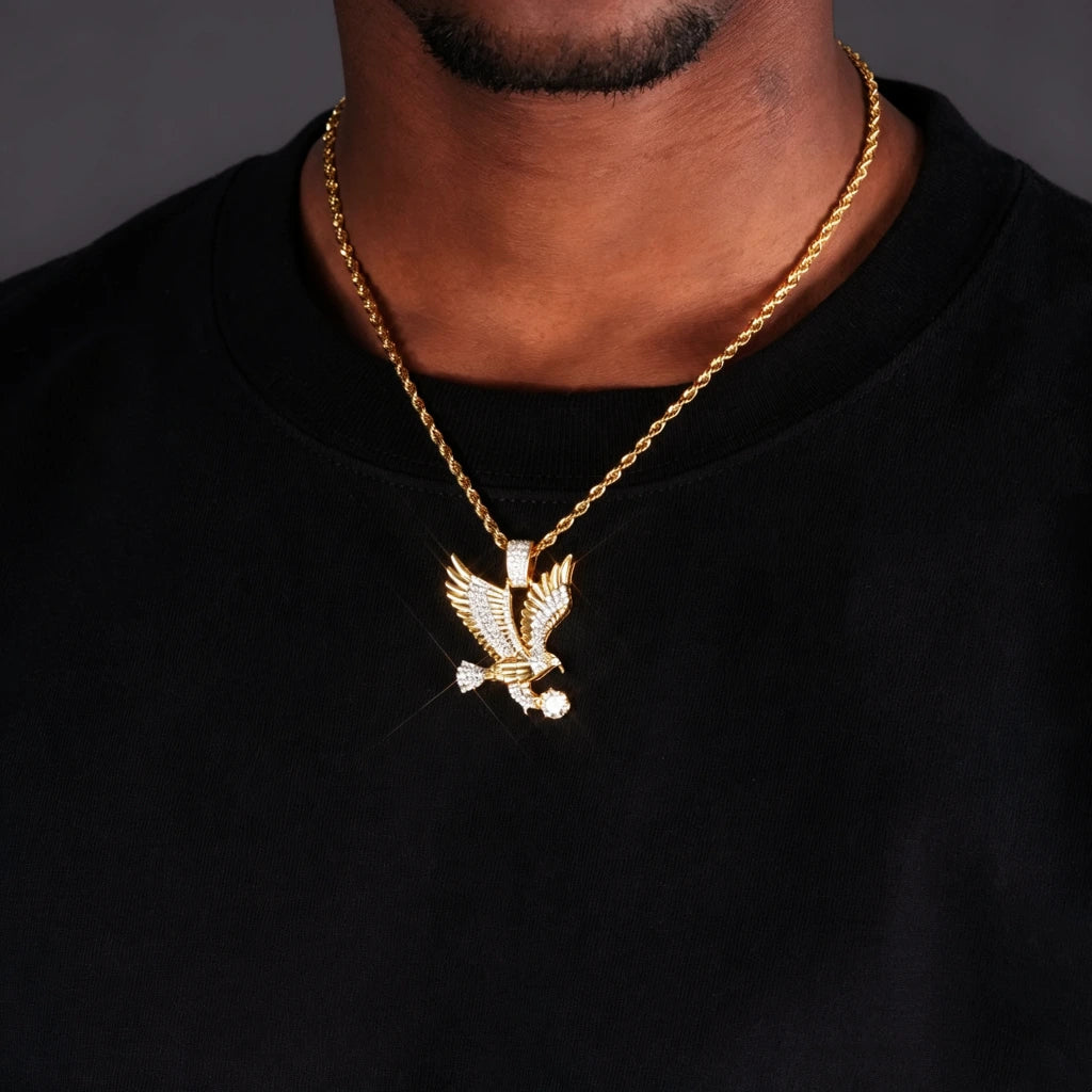 33mm Iced Victory Eagle Pendant gold plated cubic zirconia eagle charm model worn shot on neck with gold rope chain men hip hop streetwear necklace iced out rapper jewelry lifestyle wearing display RDRIP JEWELRY
