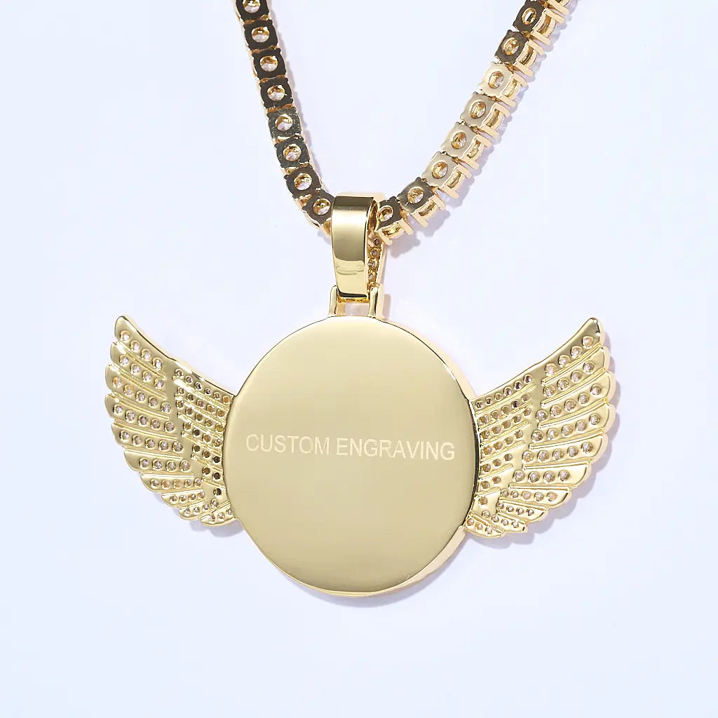 Back close-up of gold 3D Angle Wing Custom Picture Pendant with blank custom engraving plate and iced tennis chain, personalized engraving hip hop jewelry detail shot, RDRIP Jewelry
