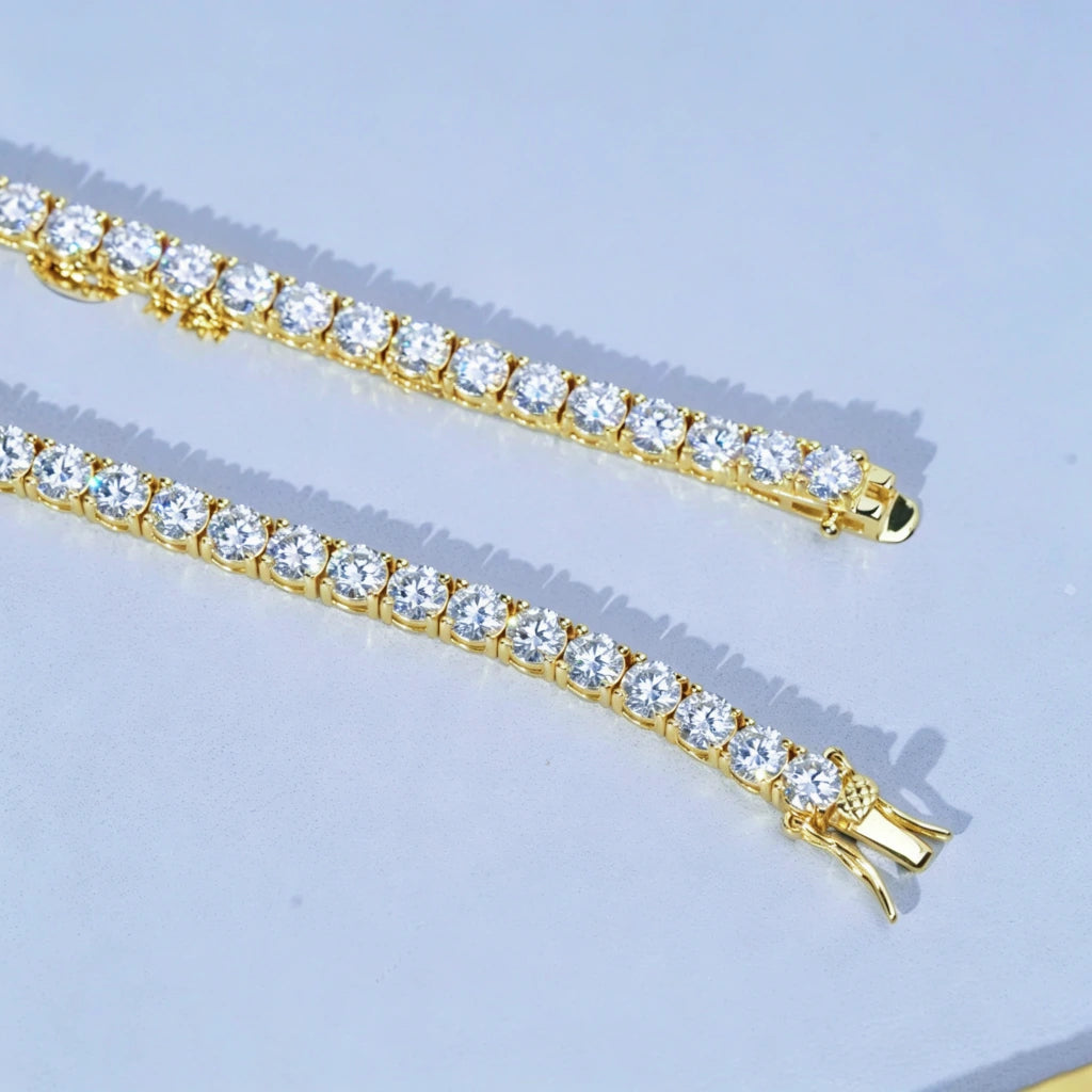 4MM double row VVS1 D-Color moissanite tennis chain on clean white plate, 925 Sterling Silver 18K gold plated finish, sparkling brilliant cut moissanite stones, luxury iced out hip hop bling jewelry display RDRIP JEWELRY