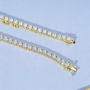 4MM double row VVS1 D-Color moissanite tennis chain on clean white plate, 925 Sterling Silver 18K gold plated finish, sparkling brilliant cut moissanite stones, luxury iced out hip hop bling jewelry display RDRIP JEWELRY