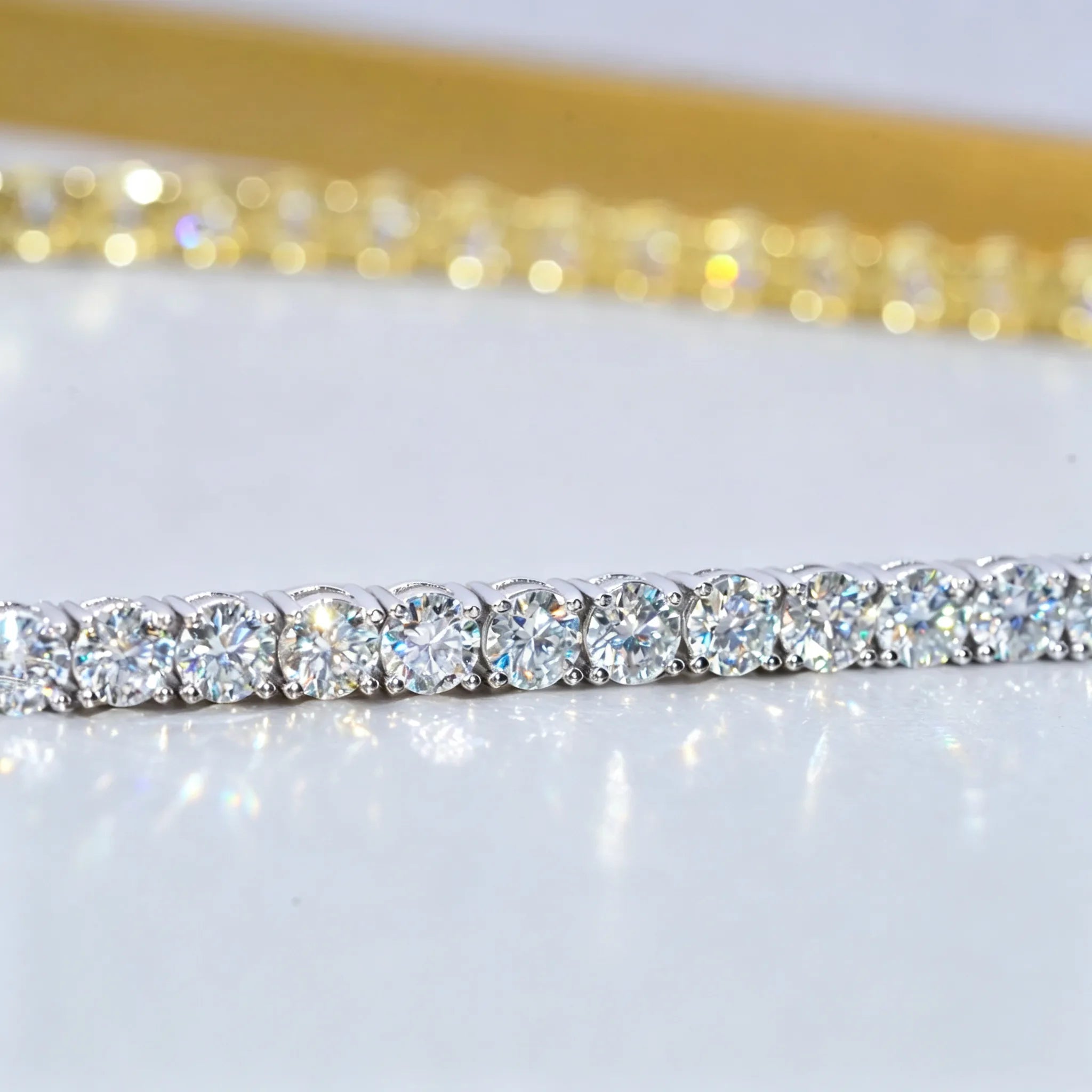 4MM VVS1 D-Color Moissanite Tennis Chain side profile sparkle view, 925 Sterling Silver White Gold Plated finish, ideal hearts and arrows cut moissanite stones with bright starburst sparkle, continuous iced out hip hop bling necklace close-up RDRIP JEWELRY
