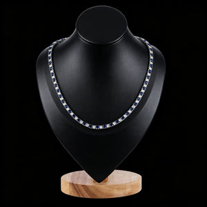 4mm Iced Out Blue and White Alternating Tennis Chain, hand‑set VVS sapphire‑blue and white simulated diamond hip hop necklace displayed on black jewelry bust, unisex two‑tone bling tennis chain RDRIP JEWELRY
