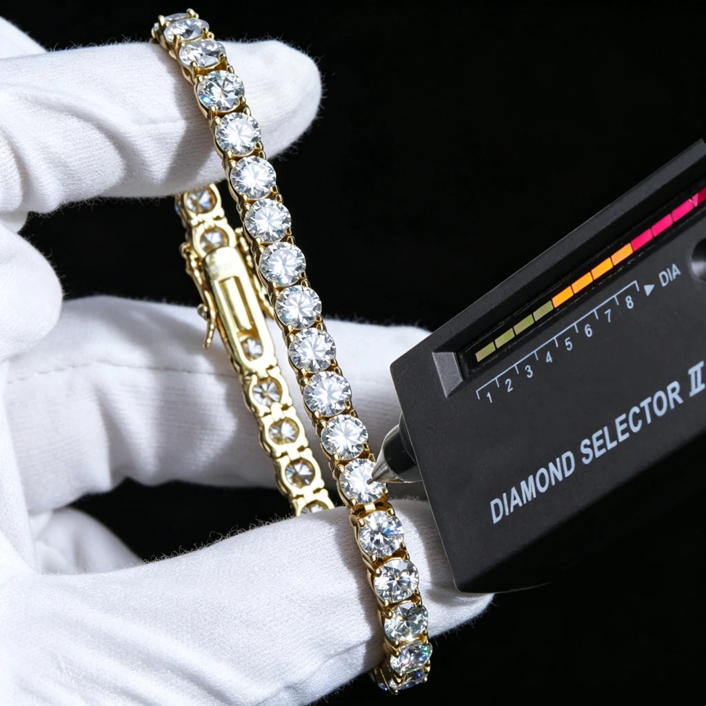 Professional studio verification photo of 5mm round D Color VVS1 clarity Hearts & Arrows cut moissanite tennis chain with thick 18K yellow gold plating over solid S925 sterling silver base, each flawless colorless moissanite gem hand prong set by skilled artisans, jewelry chain held by clean soft white cotton jewelry gloves on solid seamless pure black background, professional handheld diamond selector tester touching stone surface to display diamond passing performance, fully visible double safety lock cla