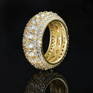 5‑Row Iced‑Out Full‑Paved Eternity Band Ring gold tone side profile close up shot showing perforated inner band heavy wide men hip hop ring full paved round cubic zirconia stones black background mirror reflection product photography RDRIP JEWELRY
