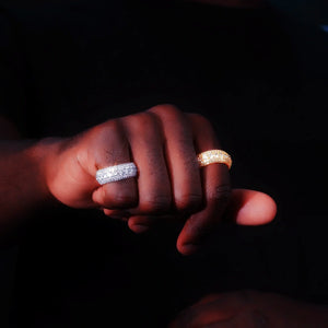 5‑Row Iced‑Out Full‑Paved Eternity Band Ring silver and gold tone men model hand wearing shot fully paved round cubic zirconia icy hip hop stacking rings dark moody background lifestyle jewelry photo RDRIP JEWELRY
