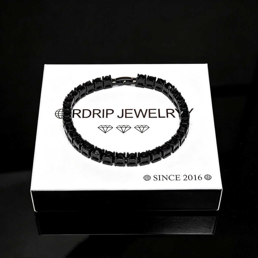 5mm Black Iced Out Tennis Bracelet resting on RDRIP JEWELRY branded gift box, prong‑set flawless VVS black simulated diamonds alloy vacuum plating hip hop unisex bling bracelet product shot on pure black reflective surface, luxury men women streetwear jewelry, RDRIP JEWELRY

