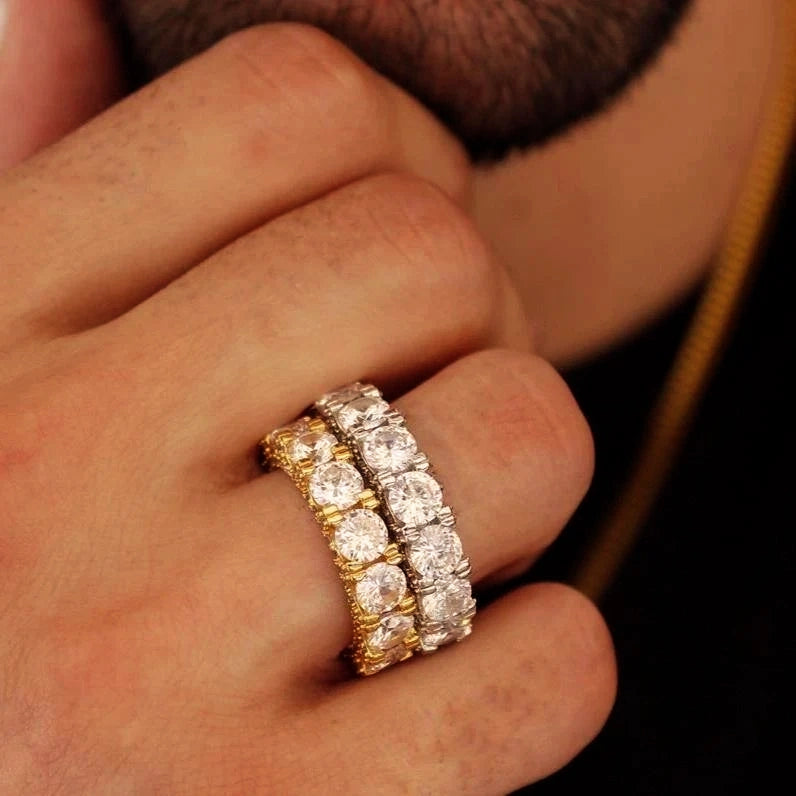 men hand wearing stacked 18k gold plated 5mm iced out round full eternity ring bold prong set aaa cubic zirconia band gold and silver tone hip hop everyday stacking ring real wear lifestyle shot RDRIP JEWELRY
