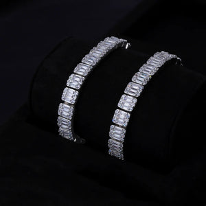 Two sizes display of 8mm 9.5mm width iced baguette cluster tennis bracelet, 7 inch and 8 inch white gold plated copper hip hop bracelets set on black velvet cushion, flawless VVS simulated baguette cluster diamonds, premium iced out bling hip‑hop jewelry for men women RDRIP JEWELRY
