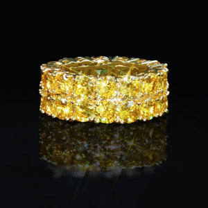 front straight view 9mm canary yellow double row iced out eternity ring sparkling aaa cubic zirconia stones reflective black background hip hop full band gold plated mens ring RDRIP JEWELRY
