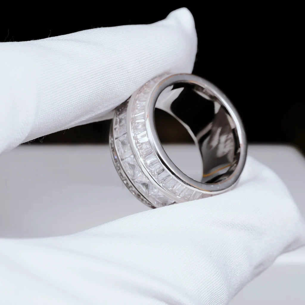 White gold plated Baguette Square Triple Row Ring inner band angle shot held by white microfiber glove, 12mm wide men hip hop ring, hand set flawless VVS simulated baguette and square cut stones full pave heavy icy bling mens statement band showing inner polished surface RDRIP JEWELRY

