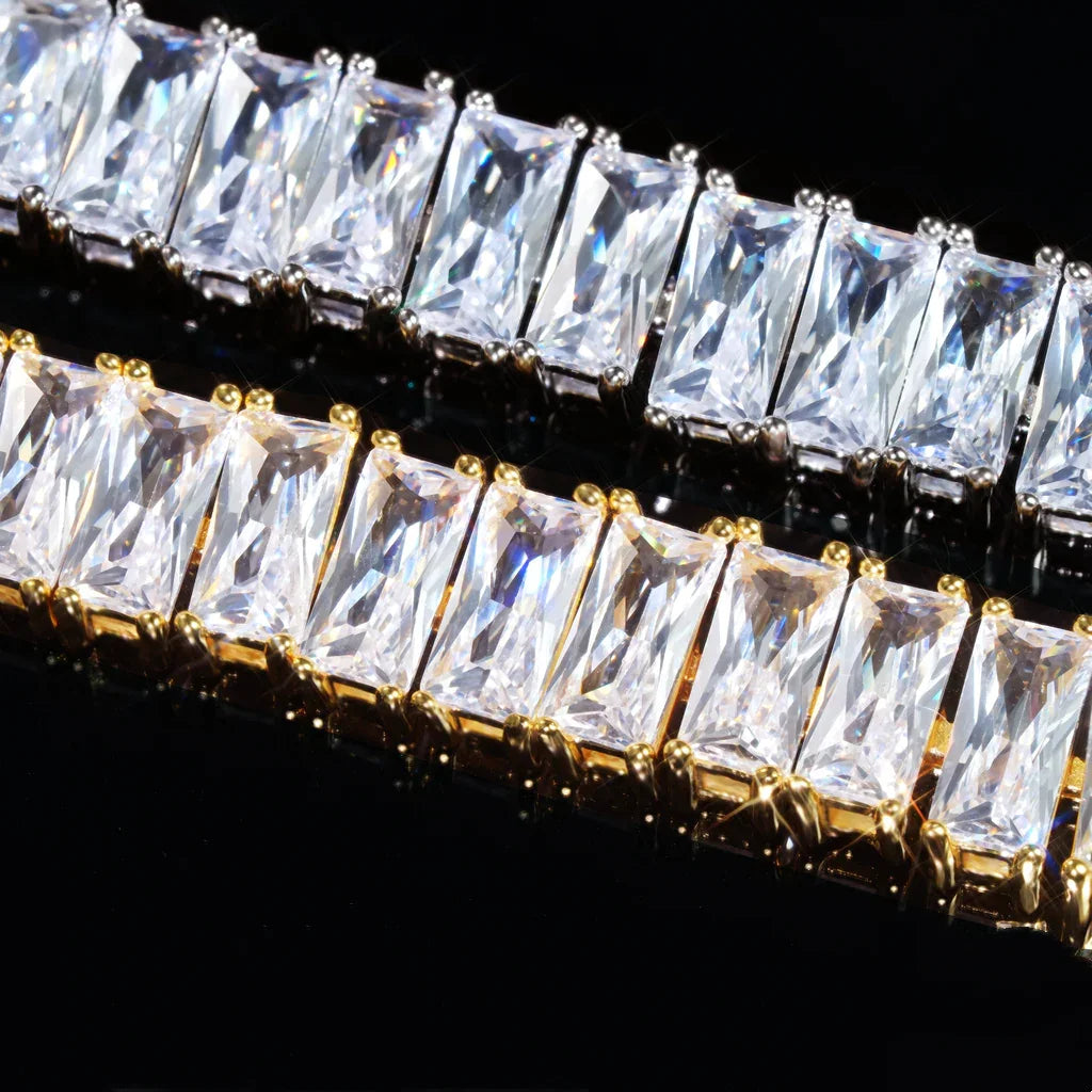 Blaze Retro Baguette‑Cut Iced Tennis Bracelet extreme macro gem close‑up, 18k gold plated and silver‑toned prong setting, hand‑set brilliant rectangular baguette‑cut AAA cubic zirconia stones, showcasing stone sparkle, crystal fire and detailed metal prong craftsmanship against deep black background, premium men unisex hip‑hop iced‑out bling jewelry RDRIP JEWELRY
