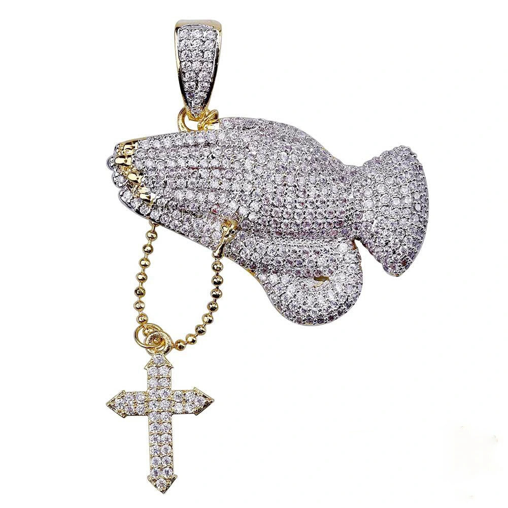 Close up shot of iced two tone blessing praying hands pendant with dangling cross charm without rope chain, fully encrusted flawless VVS simulated diamonds, copper 18k gold plated hip hop faith bling charm isolated on clean white background RDRIP JEWELRY

