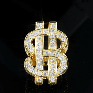 RDRIP JEWELRY Dollar Tycoon hollow double US dollar sign ring 18k gold plated version, front studio close‑up shot, full paved sparkling AAA cubic zirconia stones, interlocked dollar symbol iced out hip hop men bling ring, bright sparkle effect on solid black background

