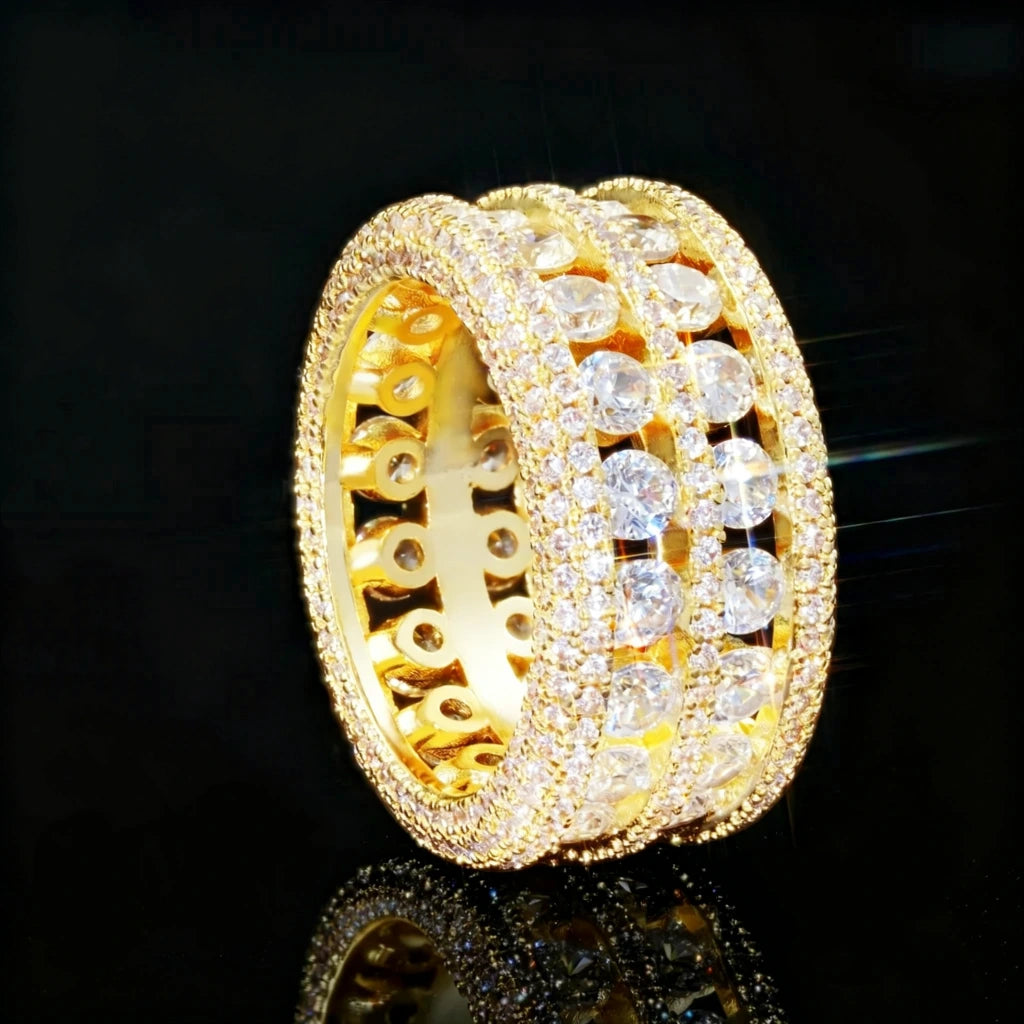 RDRIP JEWELRY full iced double rows hollow gold men ring close up side angle shot,18k gold plated copper wide band hip hop rapper ring,highly bling micro pave rhinestone hollow setting jewelry,black background with bottom mirror reflection
