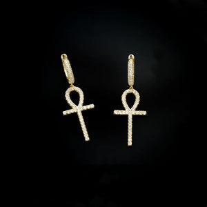 18K Gold Plated Iced Ankh Cross Dangle Huggie Hip Hop Earrings, micro pave VVS simulated diamond Egyptian life symbol drop earrings front view, unisex hip hop bling jewelry black background RDRIP JEWELRY
