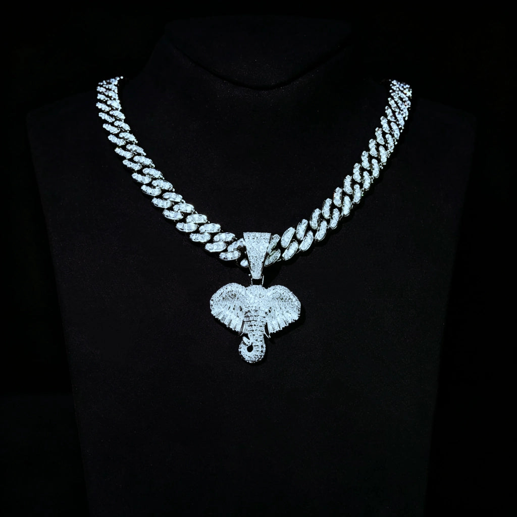 Iced micro paved pharaoh elephant head pendant necklace, fully AAA cubic zirconia paved elephant charm, iced out miami cuban link chain set, premium hip hop street bling jewelry displayed on black bust, sparkling men statement pendant gift RDRIP JEWELRY
