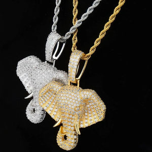 Iced micro paved pharaoh elephant head pendant in silver and 18k gold plated finish, two color hip hop charm samples paired with rope chain, full AAA cubic zirconia encrusted men bling pendant on pure black background, side view comparison shot RDRIP JEWELRY
