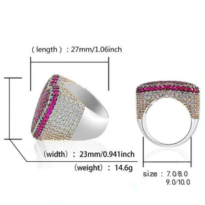 Product dimension infographic chart for magenta pink iced out pave love heart hip hop ring, marked length 27mm width 23mm weight 14.6g available ring sizes 7 8 9 10, dual‑angle ring display with measurement labels, full micro pave AAA cubic zirconia heart statement ring, white background specification graphic for streetwear rapper jewelry RDRIP JEWELRY
